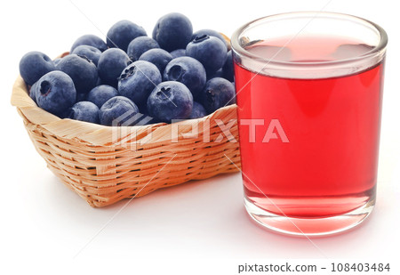 Group of fresh blueberries with juice 108403484