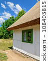 Small cozy houses. Wooden ancient buildings. Summer village and vacation. Farm bio products. 108403815