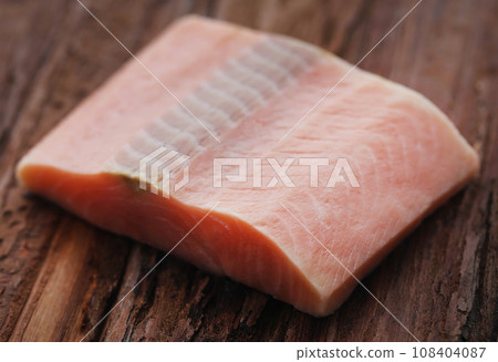 Uncooked salmon fish Uncooked salmon fish 108404087