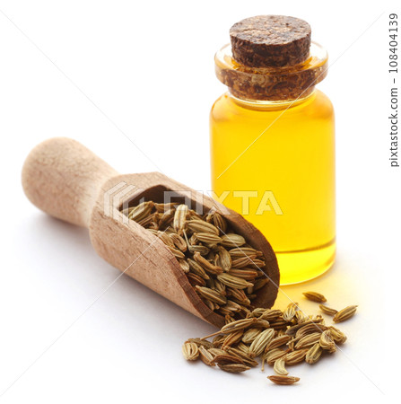 Fennel seeds with essential oil in a bottle Fennel seeds with essential oil in a bottle 108404139