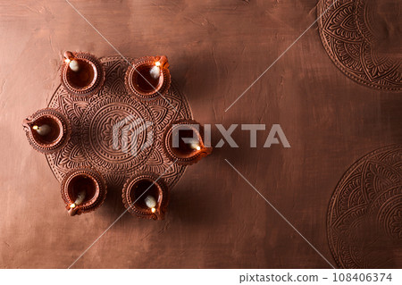 Burning diya on Happy Diwali, background for light festival of India 108406374