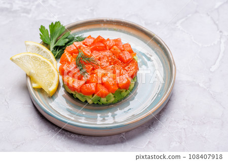 Delicious salmon and avocado tartare 108407918