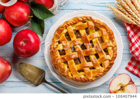 Delicious Apple Pie with Fresh Red Apples 108407944