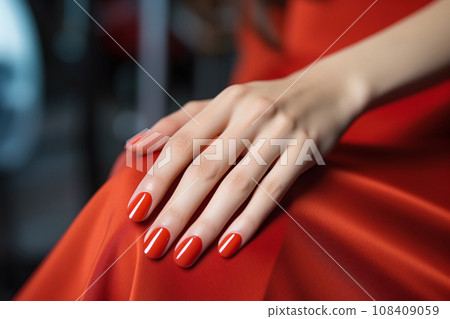 Glamour woman hand with classic red nail polish on her fingernails. Red nail manicure with gel polish at luxury beauty salon. Nail art and design. Female hand model. French manicure. Generative AI. 108409059
