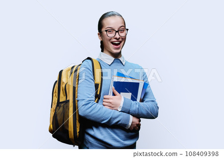 Portrait of teenage girl high school student on white background 108409398