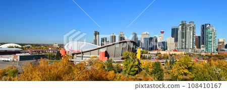 Canadian flag in Calgary city skyline at sunny day, Alberta,Canada 108410167