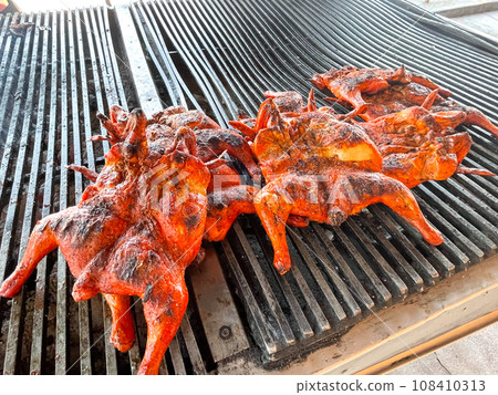 A taco restaurant along a national highway on the outskirts of Mexico City 108410313