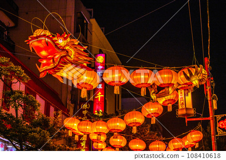 Yokohama cityscape in Japan 2024 Yokohama Chinatown with Chinese New Year lights. Dragon lanterns also appear on Ximen Street in Chinatown = November 3rd 108410618