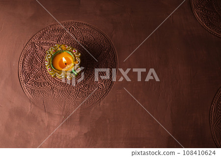 Burning diya on Happy Diwali, background for light festival of India 108410624
