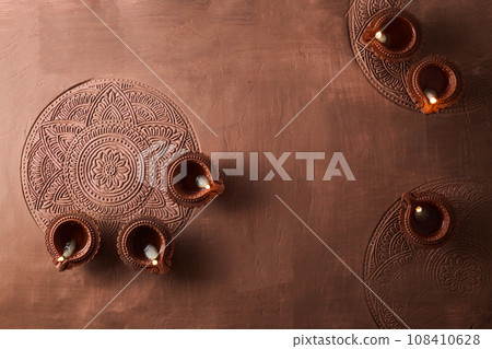 Burning diya on Happy Diwali, background for light festival of India 108410628