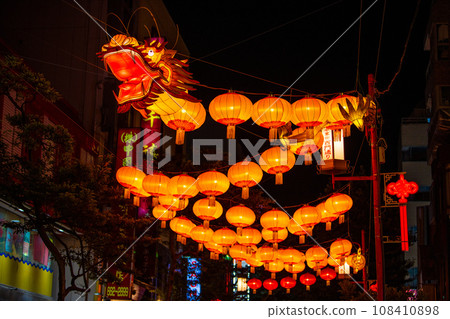 Yokohama cityscape in Japan 2024 Yokohama Chinatown with Chinese New Year lights. Dragon lanterns also appear on Ximen Street in Chinatown = November 3rd 108410898