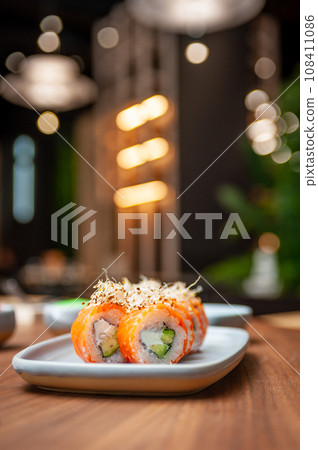 Classic Philadelphia sushi roll set with salmon and cream cheese.  108411086