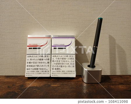 electronic cigarette on the desk electronic cigarette on the desk 108411098