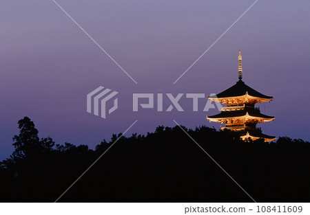 Five-storied pagoda shining at dusk Five-storied pagoda shining at dusk 108411609