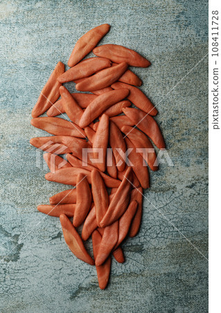 uncooked red foglie di ulivo italian pasta uncooked red foglie di ulivo italian pasta 108411728