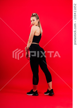 Young woman, posing in the studio. Advertising sportswear and yoga wear. Healthy lifestyle, sport Young woman, posing in the studio. Advertising sportswear and yoga wear. Healthy lifestyle, sport 108411852