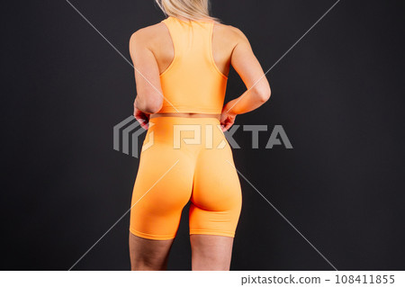 Young woman, posing in the studio. Advertising sportswear and yoga wear. Healthy lifestyle, sport Young woman, posing in the studio. Advertising sportswear and yoga wear. Healthy lifestyle, sport 108411855