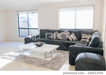 Modern living room with sofa and coffee table, interior design decoration concept Modern living room with sofa and coffee table, interior design decoration concept 108412591