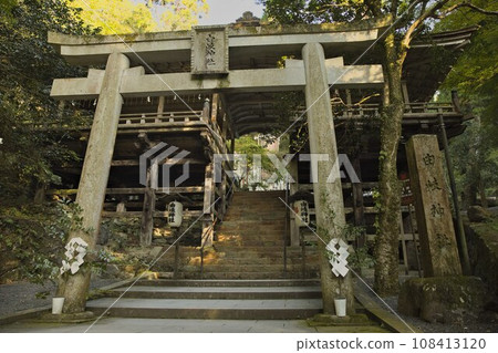 Torii and worship hall on the approach to Yuki Shrine Torii and worship hall on the approach to Yuki Shrine 108413120