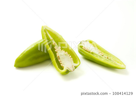 Whole and half of green bell pepper with soft shadow isolated on white background. . Whole and half of green bell pepper with soft shadow isolated on white background. . 108414129
