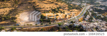 Aerial photo of massive ancient theatre of Halicarnassus, Bodrum, Turkey with road crossing town. historical places 108416523