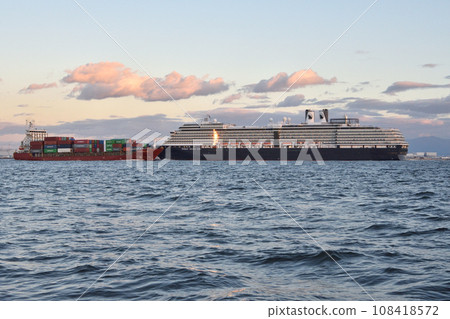 Luxury cruise ships and container ships in Osaka Port Luxury cruise ships and container ships in Osaka Port 108418572