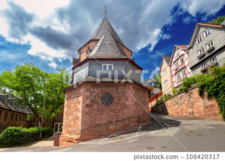 Marburg. An old medieval street in the historical center on a bright sunny day. Marburg. An old medieval street in the historical center on a bright sunny day. 108420317