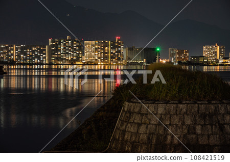 Night view of apartment complexes seen from Otsu Port, Lake Biwa Night view of apartment complexes seen from Otsu Port, Lake Biwa 108421519