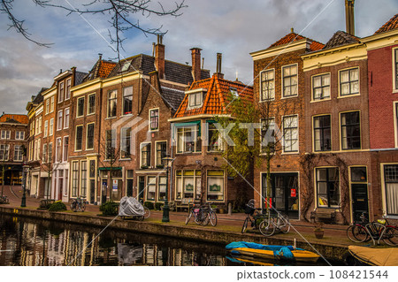 Cityscape of Amsterdam, old type buildings and channels 108421544