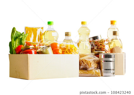 Foodstuffs in donation box isolated on white background for volunteer to help people. Foodstuffs in donation box isolated on white background for volunteer to help people. 108423240