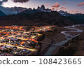 An observation deck that offers a panoramic view of Fitz Roy, a mountain representing the Patagonia region in southern Argentina, and the city lights. 108423665