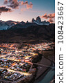 An observation deck that offers a panoramic view of Fitz Roy, a mountain representing the Patagonia region in southern Argentina, and the city lights. 108423667