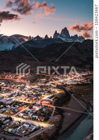 An observation deck that offers a panoramic view of Fitz Roy, a mountain representing the Patagonia region in southern Argentina, and the city lights. An observation deck that offers a panoramic view of Fitz Roy, a mountain representing the Patagonia region in southern Argentina, and the city lights. 108423667