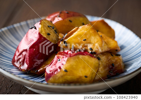 Daigaku sweet potato on a plate Daigaku sweet potato on a plate 108423940