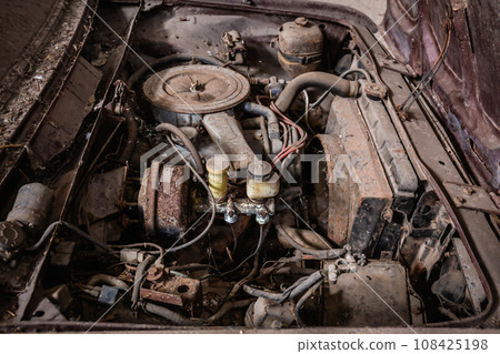 old rusty and dusty car engine is left idle. vintage car old rusty and dusty car engine is left idle. vintage car 108425198