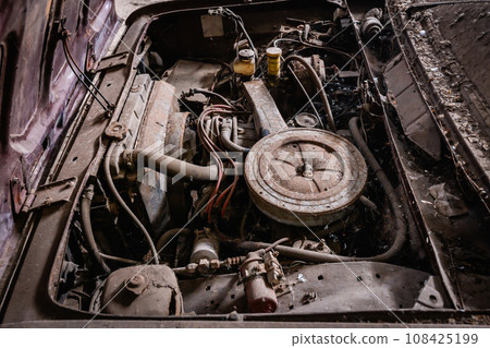 old rusty and dusty car engine is left idle. vintage car old rusty and dusty car engine is left idle. vintage car 108425199