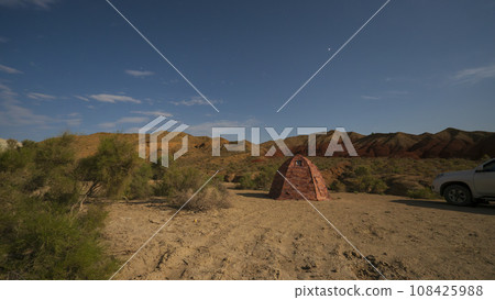 A bright starry night in the colored mountains. A bright starry night in the colored mountains. 108425988