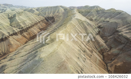 Colorful high mountains and a canyon made of clay Colorful high mountains and a canyon made of clay 108426032