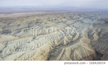 Colorful high mountains and a canyon made of clay 108426034
