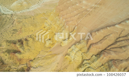 Colorful high mountains and a canyon made of clay 108426037