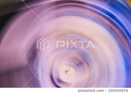 Smoky purple artistic blur with outer dark blue rim of ripple drop in abstract art 108426978