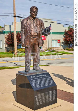 Statue of Fred Duesenberg on bright sunny day 108427496