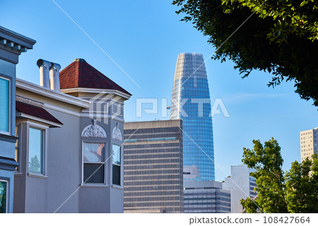 Tops of buildings in San Francisco facing toward distant Salesforce Tower office building 108427664