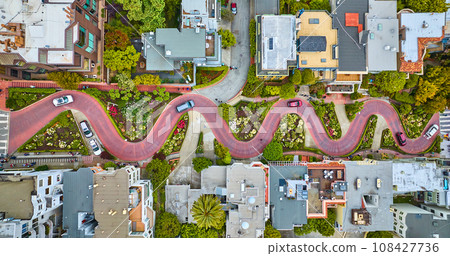 Straight down view Lombard Street with cars driving down red brick road aerial Straight down view Lombard Street with cars driving down red brick road aerial 108427736