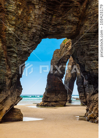 Natural rock arches Cathedrals beach, Playa de las Catedrales at Ribadeo, Galicia, Spain 108428179