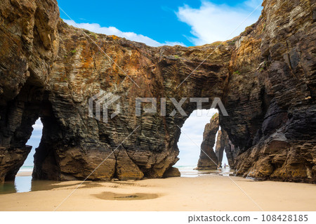 Natural rock arches Cathedrals beach, Playa de las Catedrales at Ribadeo, Galicia, Spain 108428185