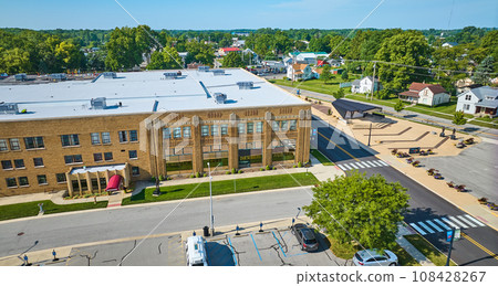 Aerial side entrance of ACD Automobile Museum with parking lot on bright sunny day 108428267