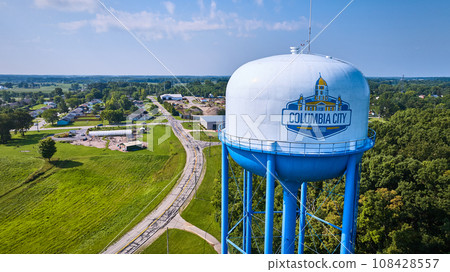 Close up aerial Columbia City water tower with neighborhood and industrial area in background Close up aerial Columbia City water tower with neighborhood and industrial area in background 108428557