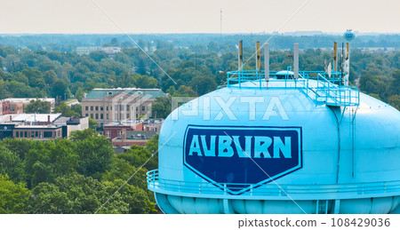Close up of Auburn water tower with Dekalb County Court House in background aerial 108429036
