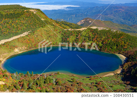 Spectacular view of Goshikinuma ``Witch's Eye'' seen from Mt. Issekyo in autumn 108430551